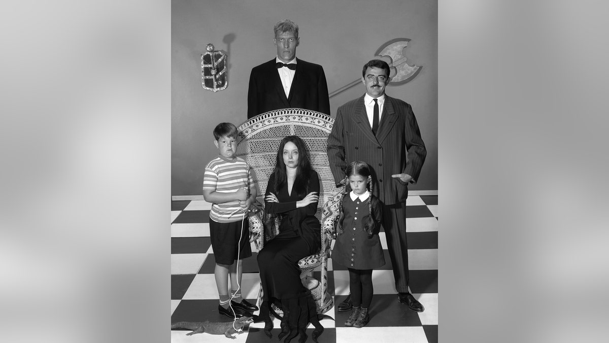 The Addams family cast in a group photo