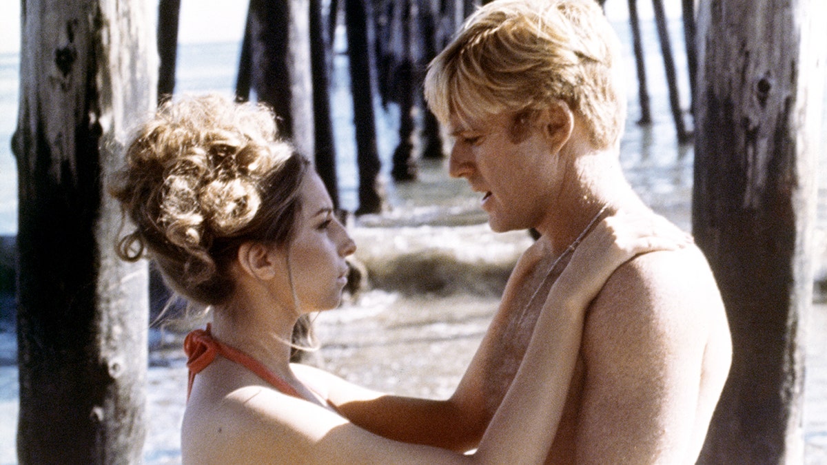 American actress and singer Barbra Streisand and actor Robert Redford on the set of The Way We Were