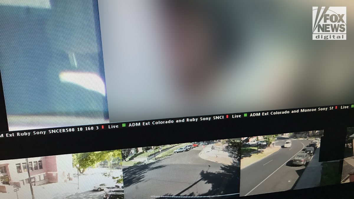 Security images visible on a computer monitor