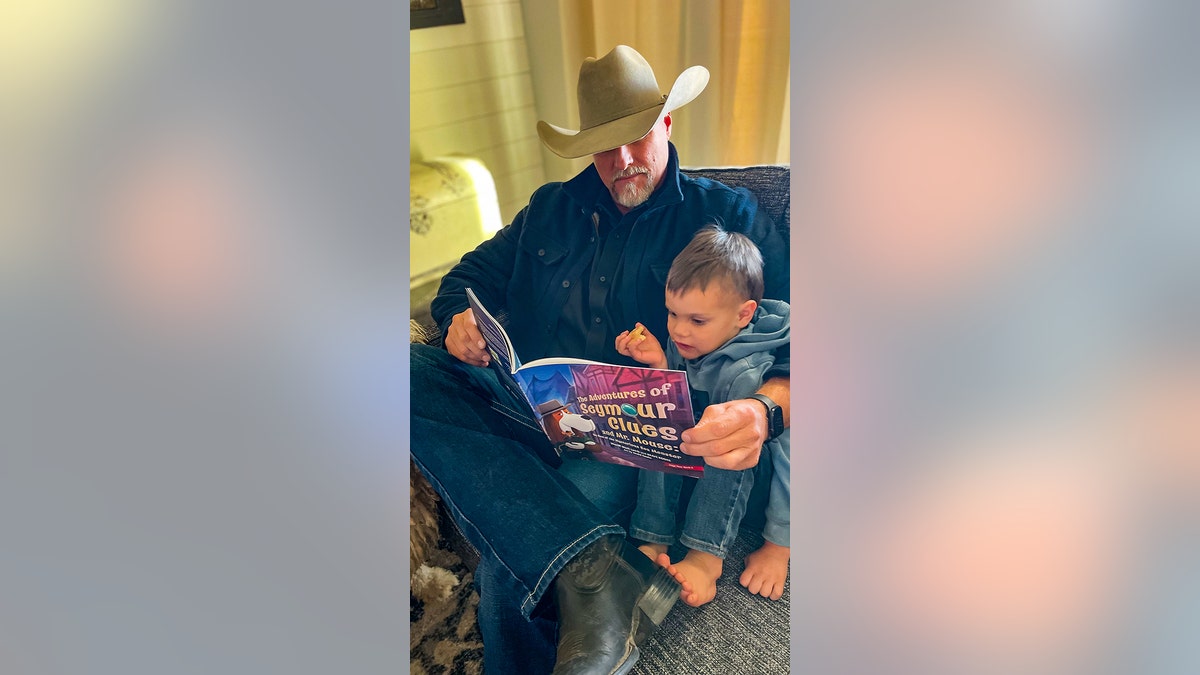 Sheriff Mark Lamb reads to a grandson