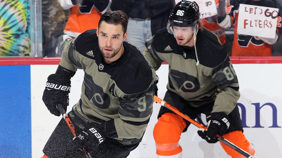 ESPN writer calls out Flyers player for wearing jersey to support military  but skipping LGBTQ sweater