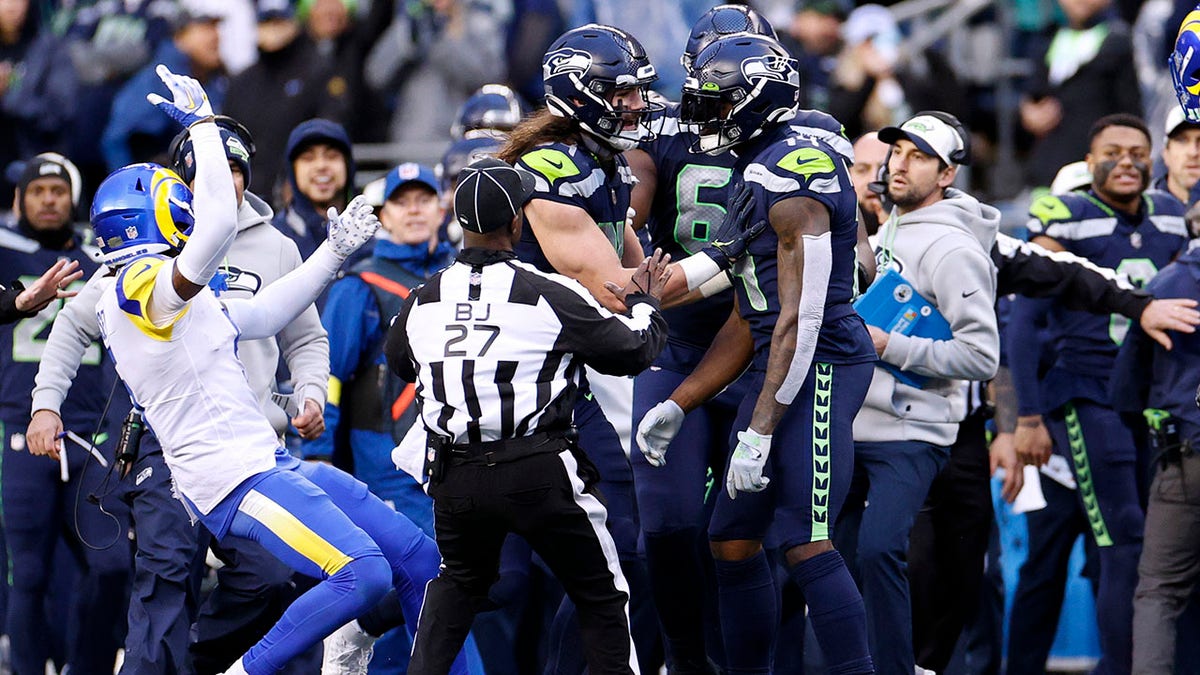 Jalen Ramsey argues with a Seahawks player