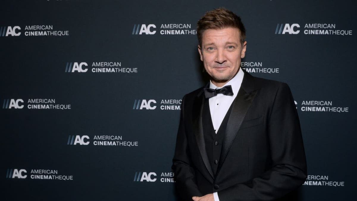 Jeremy Renner poses for photos at the American Cinematheque Awards
