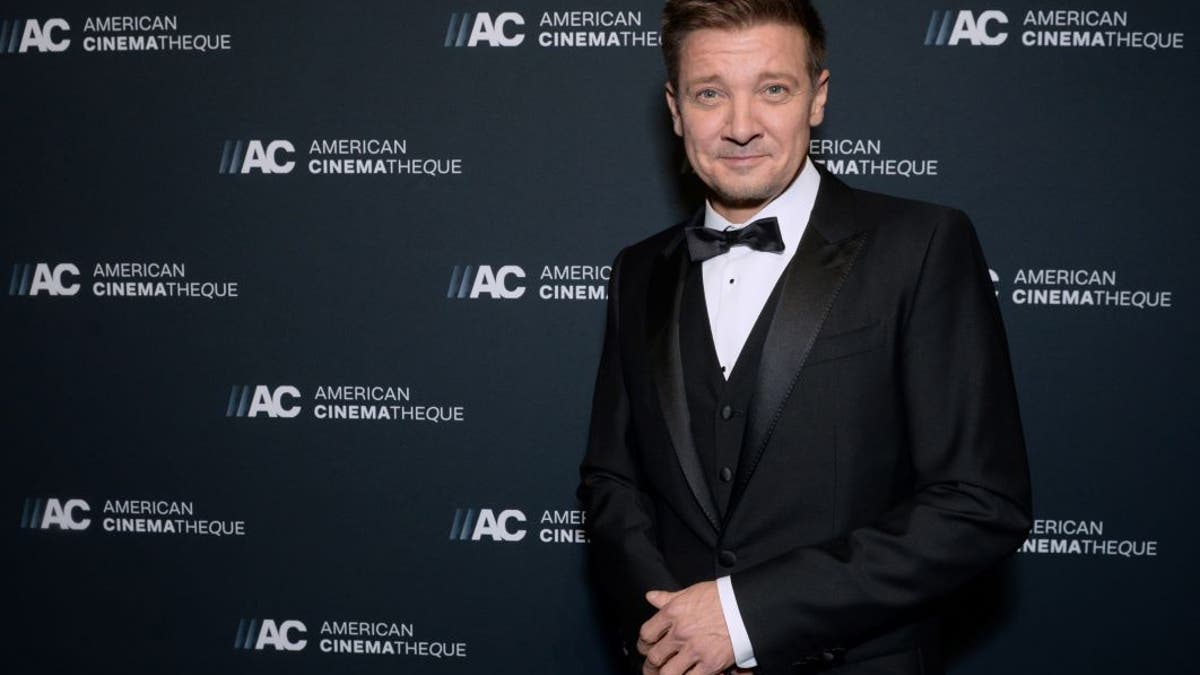 Jeremy Renner poses for photos at the American Cinematheque Awards