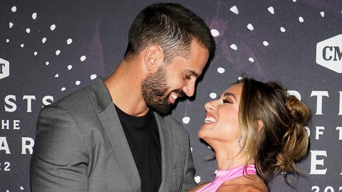 Jessie James Decker, Eric Decker enjoy weekend getaway with cheeky  snapshots in the snow and topless painting