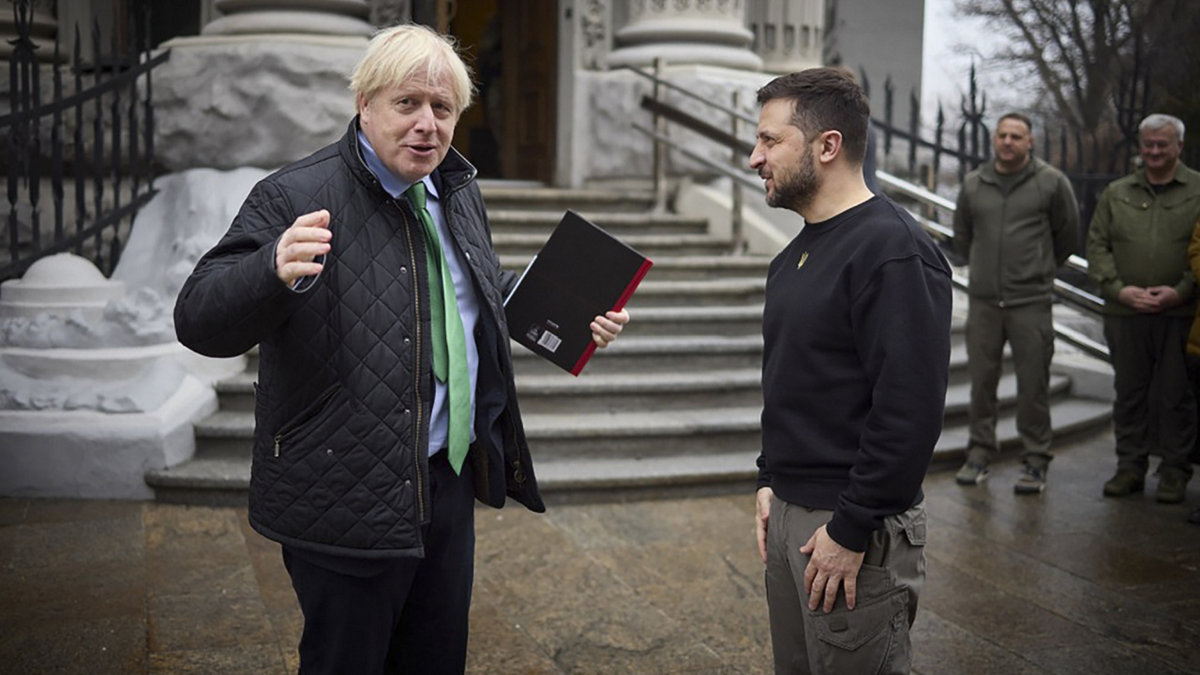 Ukraine President Zelenskyy, right, meets former UK prime minister Boris Johnson