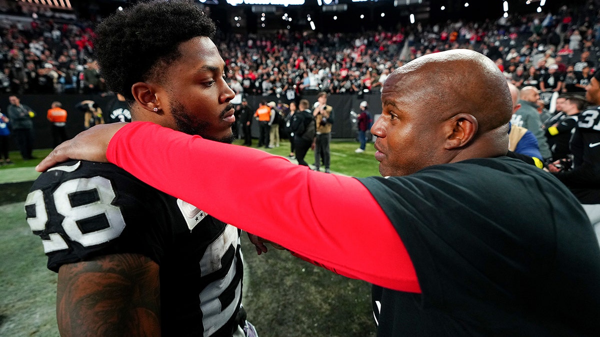 Touching moment Raiders running back Josh Jacobs surprises his dad with a  new house