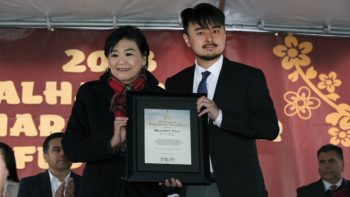 Rep. Judy Chu appears with Brandon Tsay 