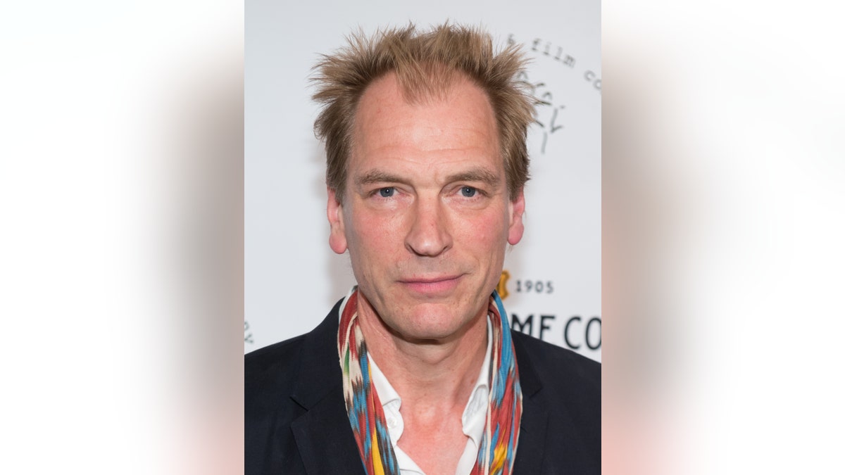 Julian Sands on red carpet in New York.