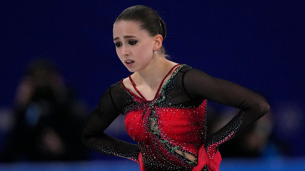 Kamila Valieva, of the Russian Olympic Committee, reacts