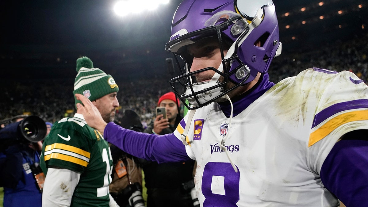 Kirk Cousins walks off the field