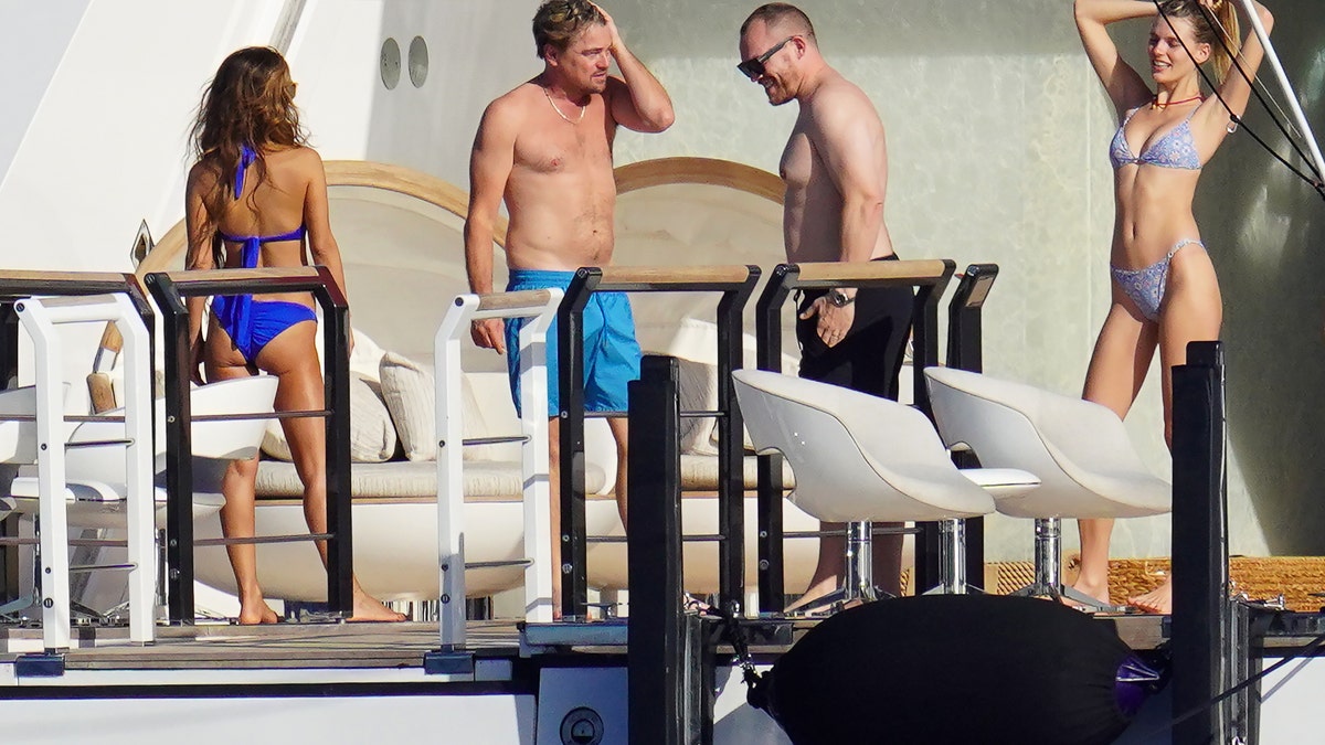 Leo hangs out with people on a yacht