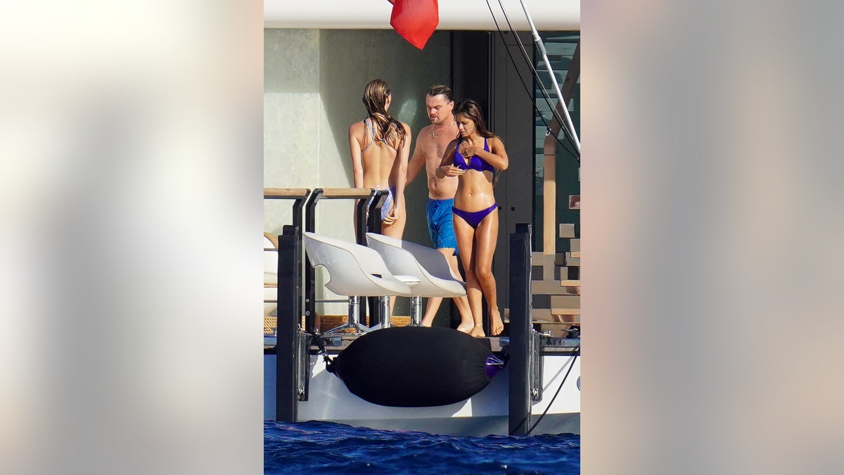 Leo on a yacht with girls