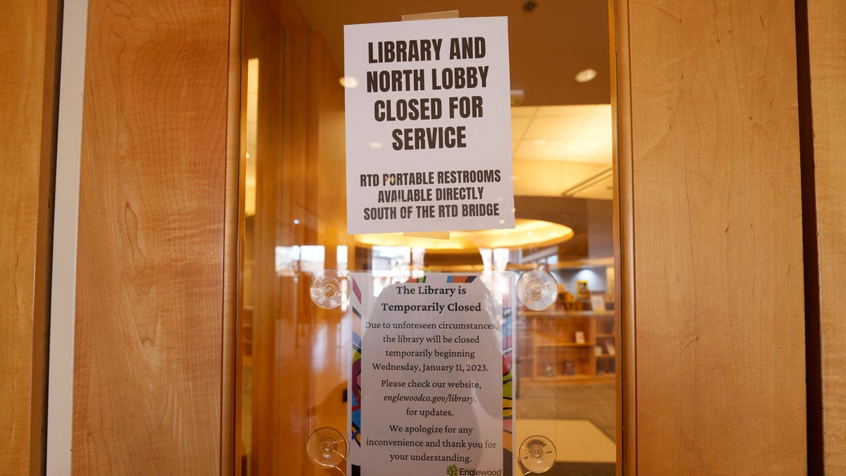 Closed sign at a Colorado library informing visitors of meth contamination.