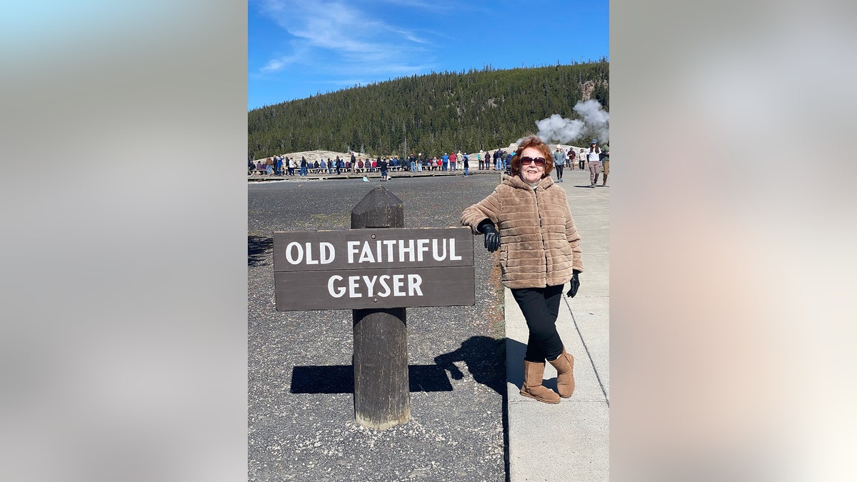 Marhie Duncan visiting Old Faithful