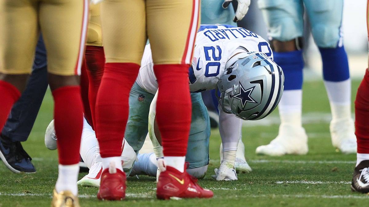 Tony Pollard reacts on the football field