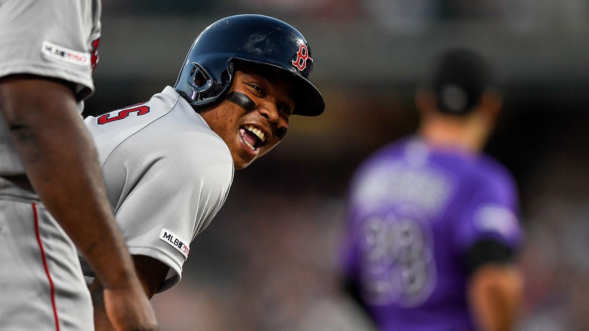 Baseman Rafael Devers reaches third base 