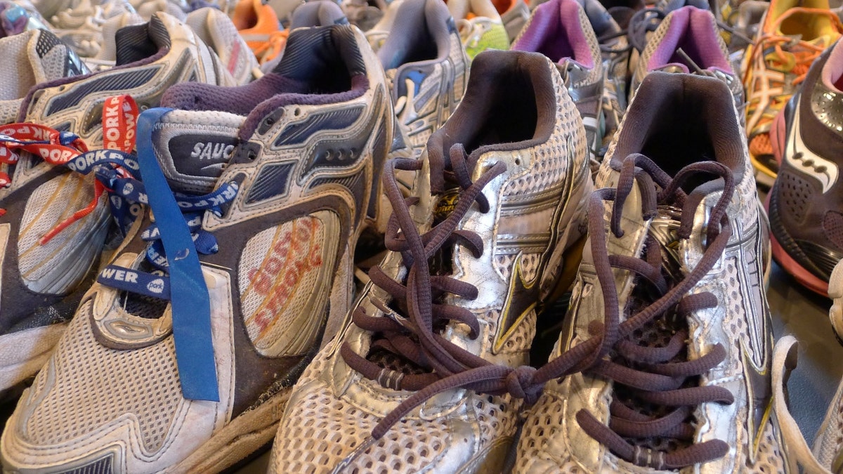 A running shoe memorial to the victims of the 2013 Boston Marathon bombing