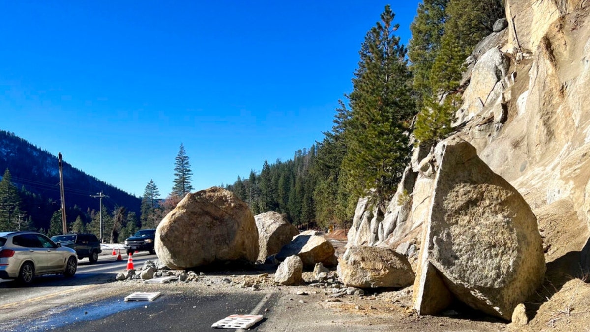 Boulders lie in the middle of a California highway