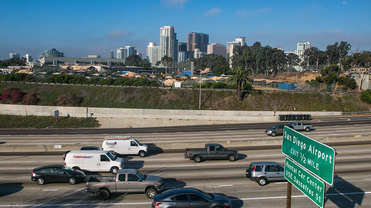 San Diego freeway with city skyline in background