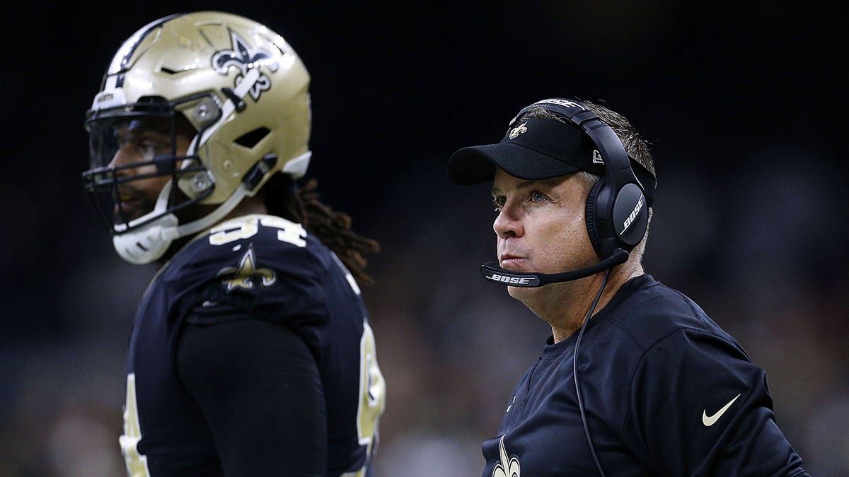 Sean Payton and Cameron Jordan during a Saints game
