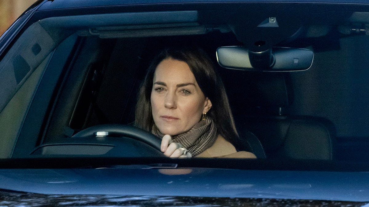 Kate Middleton driving while looking serious