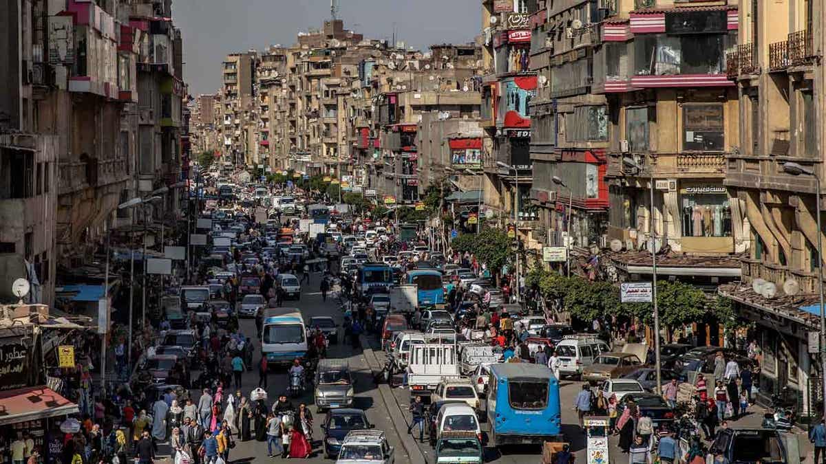 People in a crowded street in Cairo