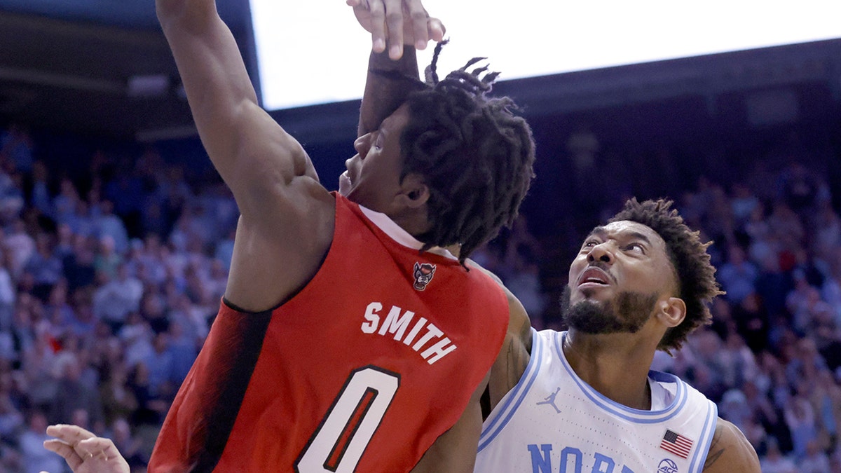 NC State player taken off the court