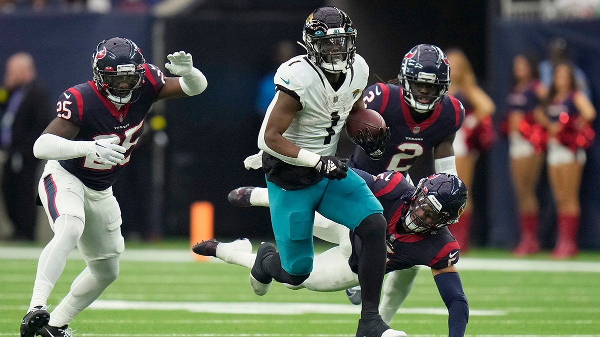 Jacksonville Jaguars cornerback Tyson Campbell (32) runs during an