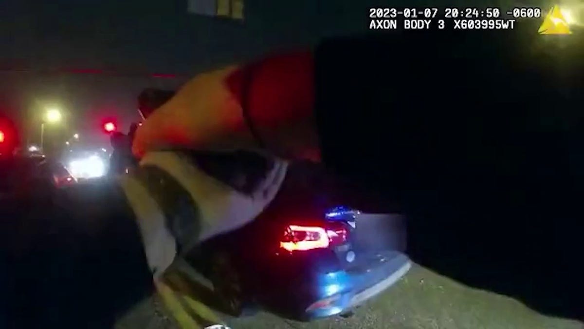 An officer's hands in a bodycam