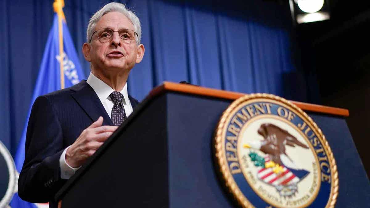 Attorney General Merrick Garland behind DOJ lectern