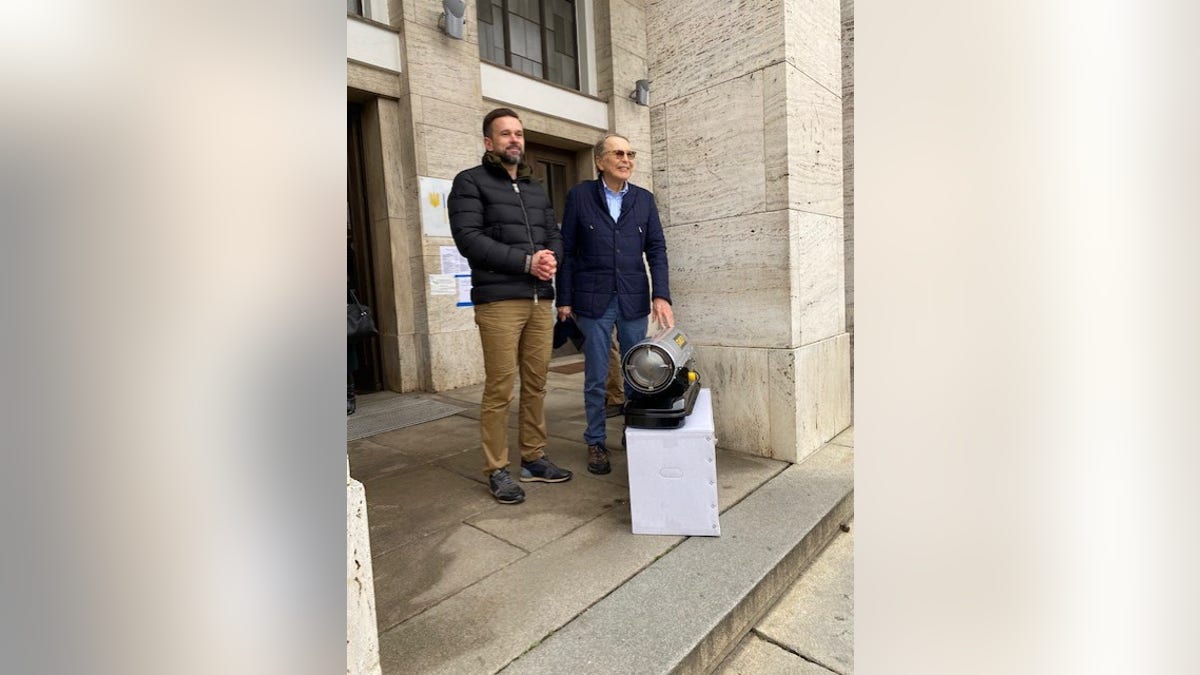 Philanthropist and former U.S. Ambassador to Finland Earle Mack pictured with the first of the heaters that was delivered the governor of the Zakarpattia region