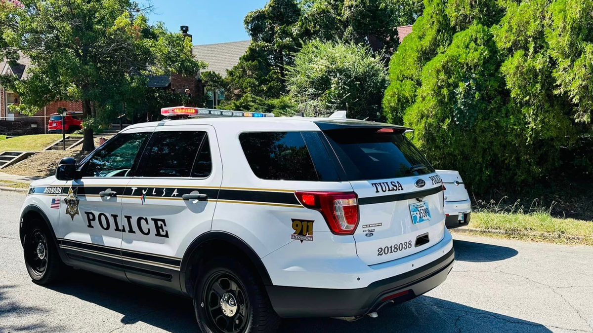 Tulsa police cruiser on residential street