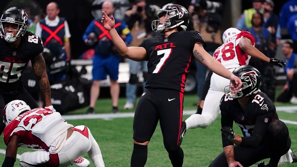 Atlanta Falcons kicker Younghoe Koo (7) walks off the field after the Miami  Dolphins defeated the Atlanta Falcons during a preseason NFL football game,  Saturday, Aug. 21, 2021, in Miami Gardens, Fla. (