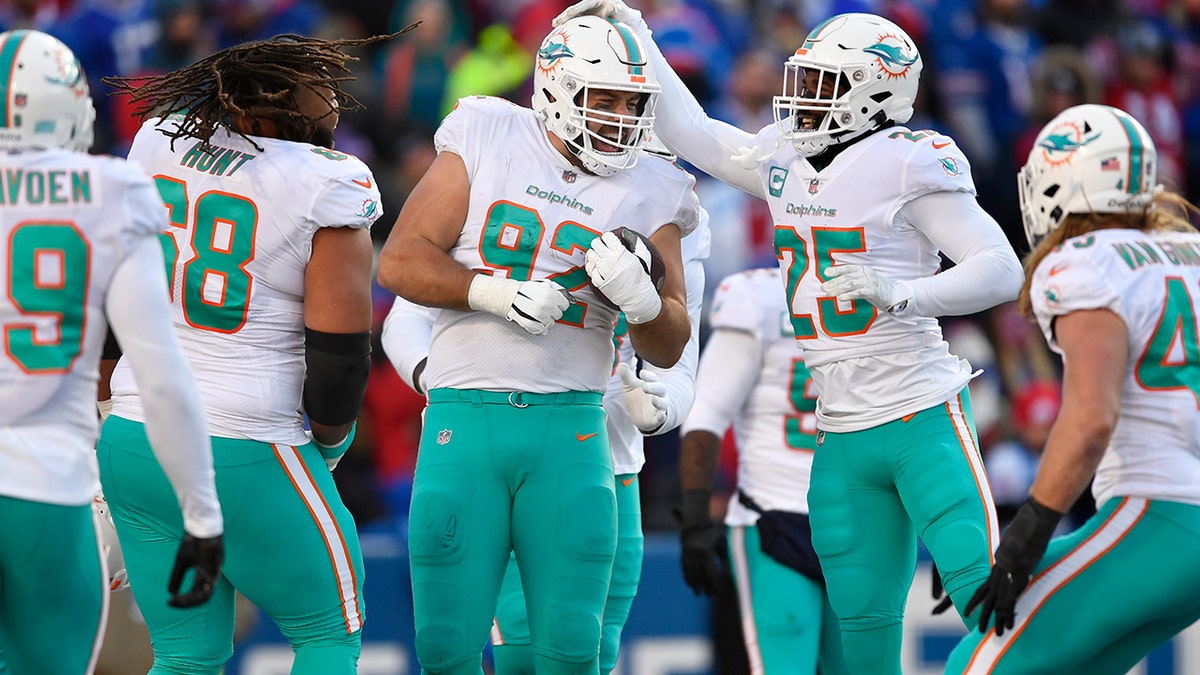 Bills' Josh Allen involved in skirmish with Dolphins' Christian Wilkins in  playoff game