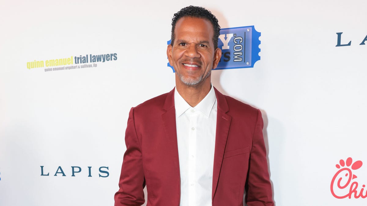Andre Reed smiles