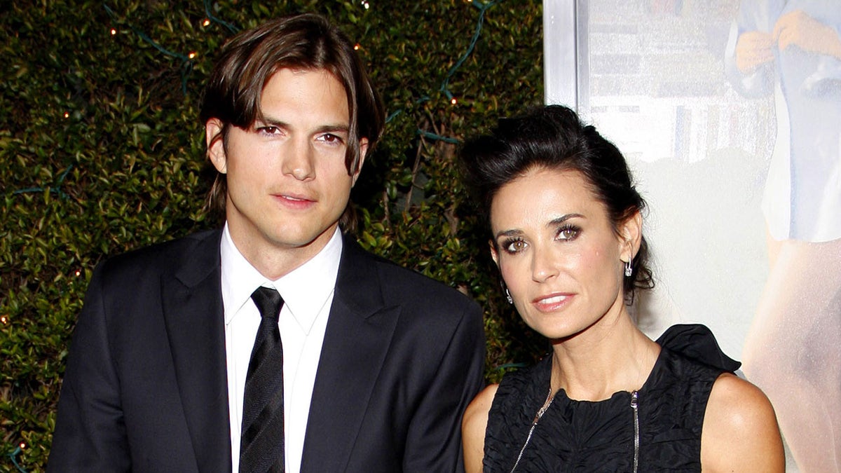 Ashton and Demi Moore in 2011