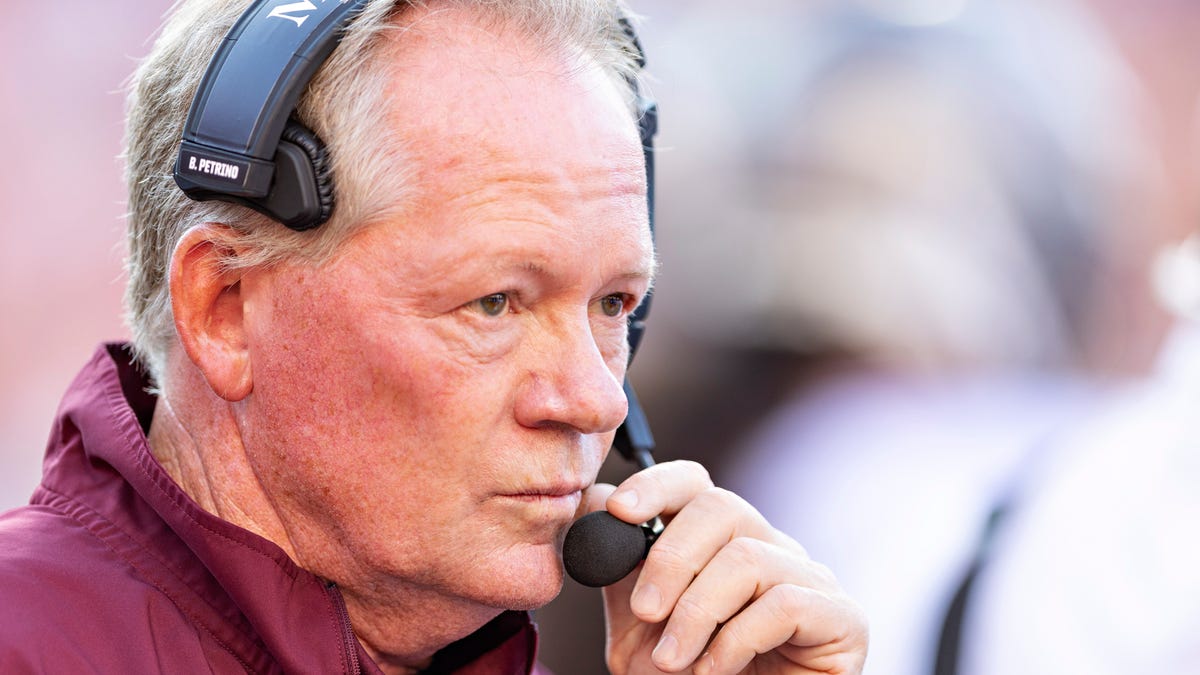 Bobby Petrino with headset on