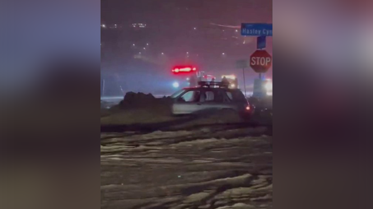 Vehicle stuck due to dangerous California flooding