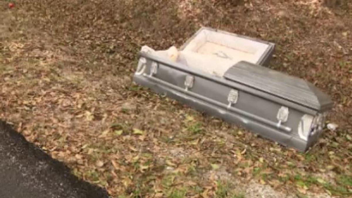 Casket thrown in ditch