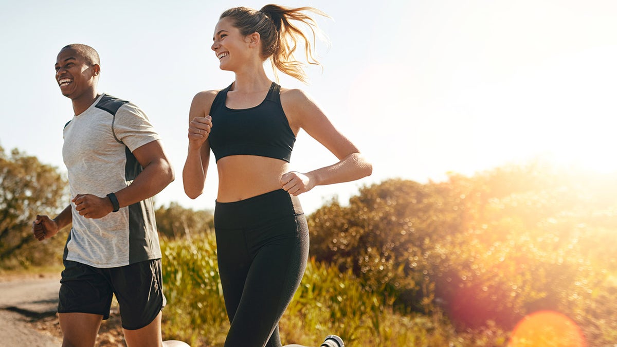 couple running health and fitness