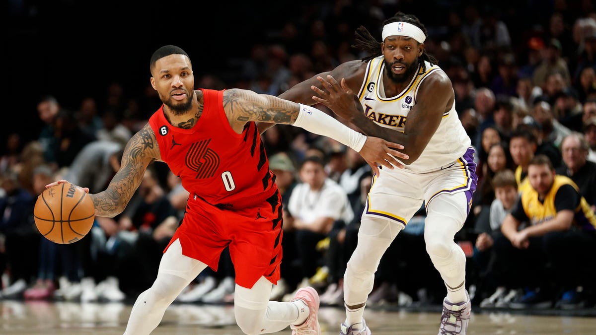 Blazers Damian Lillard calls Lakers Patrick Beverley a con man as on court feud boils over to Twitter Fox News