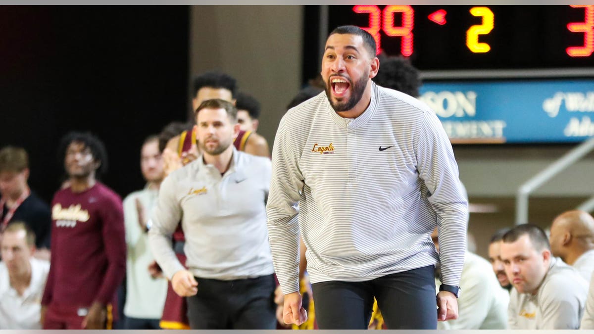 Drew Valentine yells on court