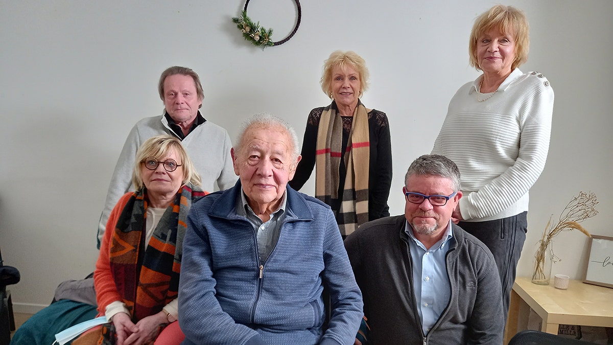 George Bourlet's grandchildren sitting with David Rossler. (Back left to right: ?Bernard Moens, Anne Moens and Pascale Moens. Front left to right: Christine Moens, David Rossler and Xavier Dedoncker