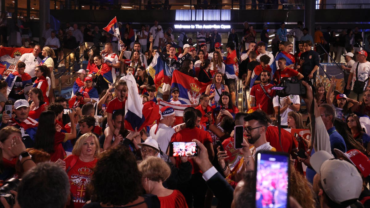 Fans celebrate outside Australian Open