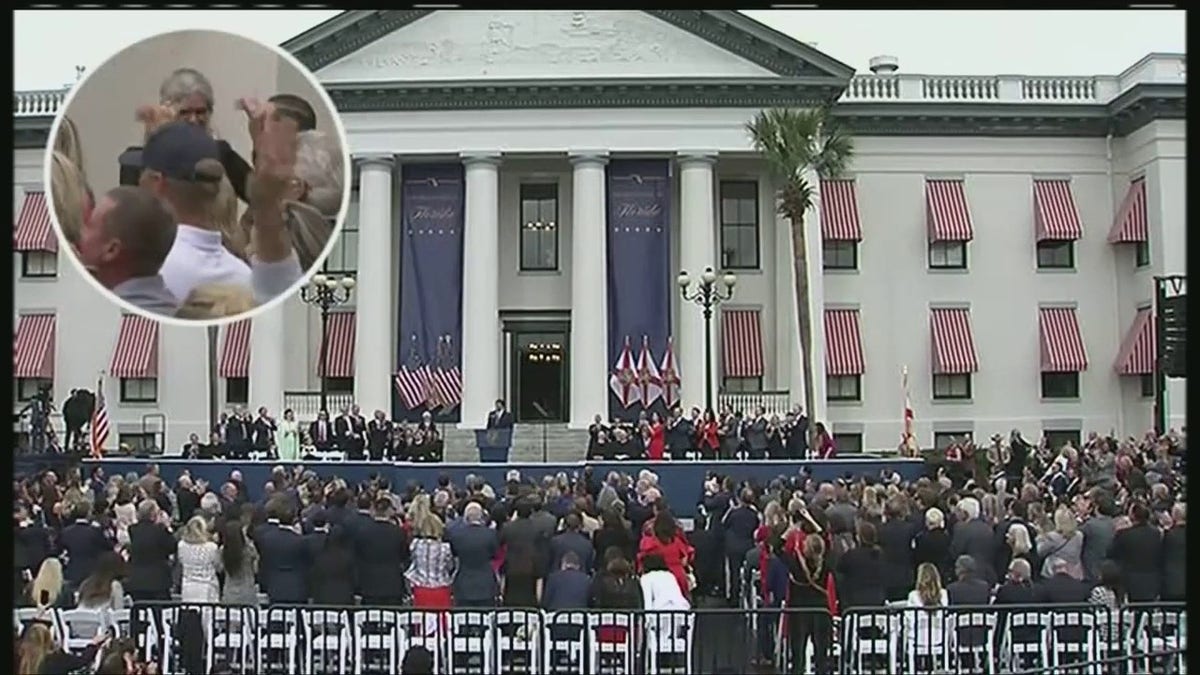 A crowd applauds Gov. Ron DeSantis during his second inaugural address.
