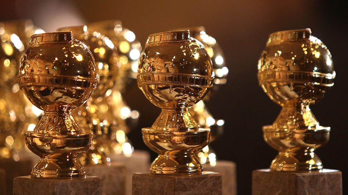actual golden globe awards lined up