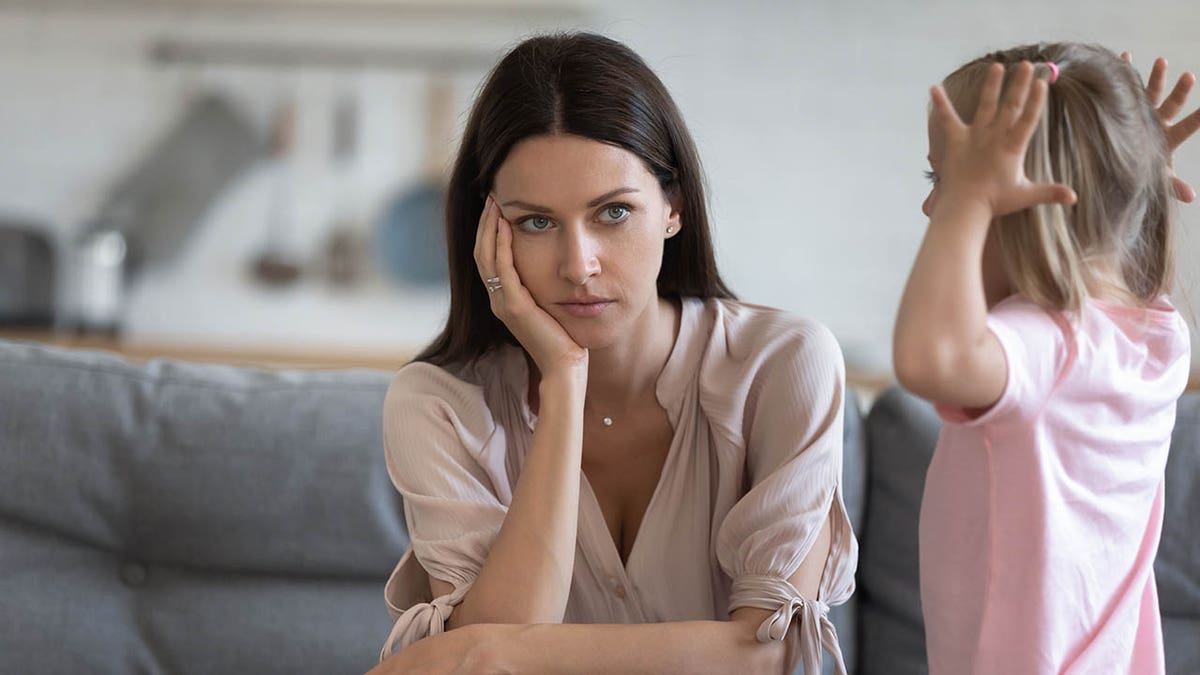 unhappy mother w screaming toddler