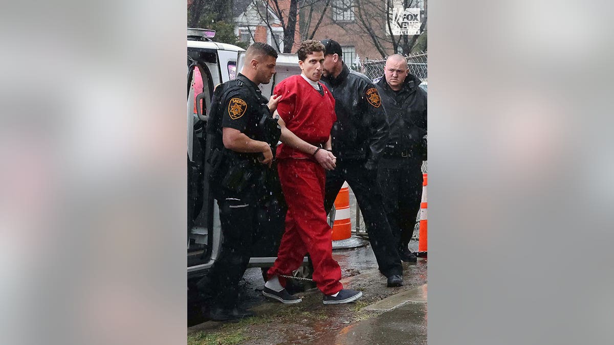 Bryan Kohberger wears red jumpsuit as he walks to court house