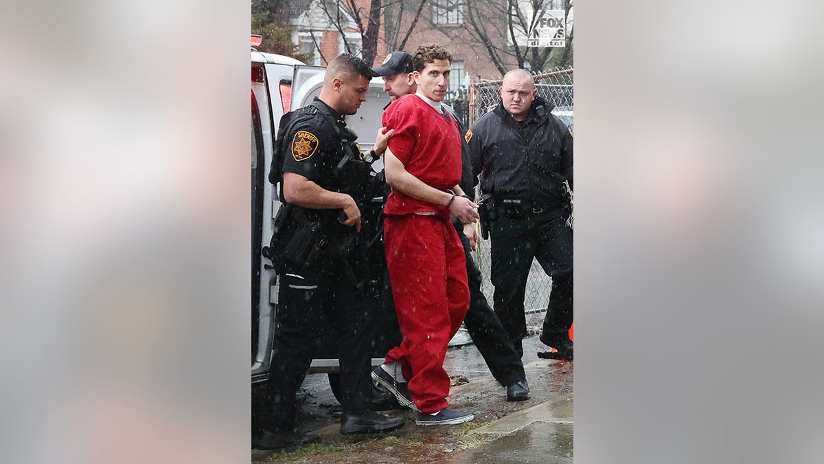 Bryan Kohberger wears red jumpsuit as he walks to court house